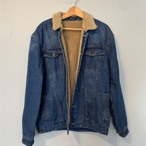 Oversized denim jacket with fuzzy lining and collar. Fits like a size L